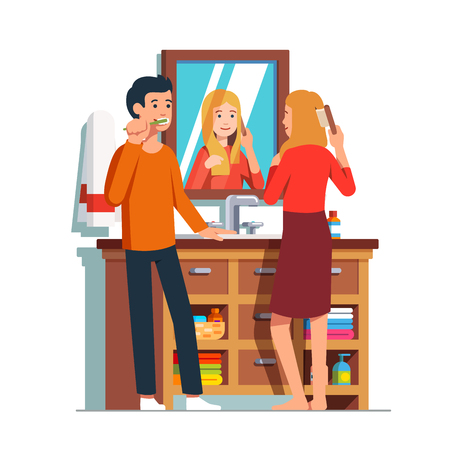 Woman brushing hair standing in front of bathroom mirror, man cleaning teeth with toothbrush.のイラスト素材