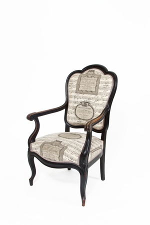 Beautiful old note textile padded chair on white backgroundの写真素材