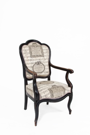 Beautiful old note textile padded chair on white backgroundの写真素材