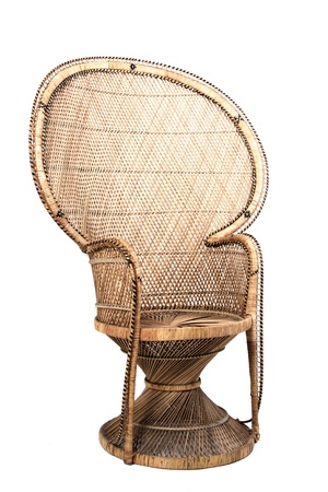 Large brown ornate cane chair on white backgroundの写真素材