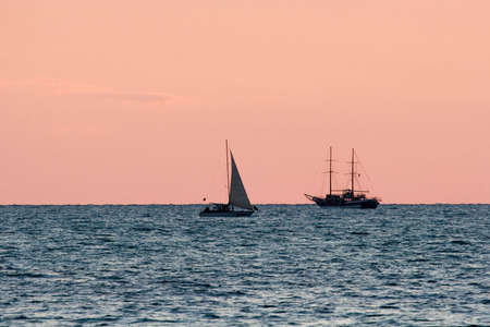 The two boats on skylineの写真素材