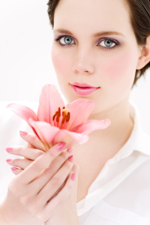 Young woman with lily.の写真素材