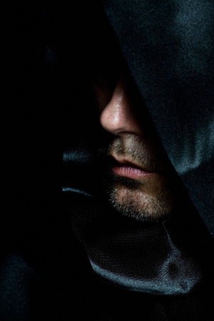 Monk in black hood.の写真素材
