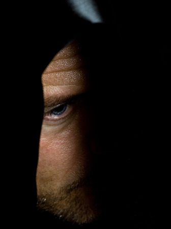 Monk in black hood.の写真素材