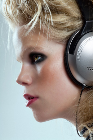 Girl in headphones.の写真素材