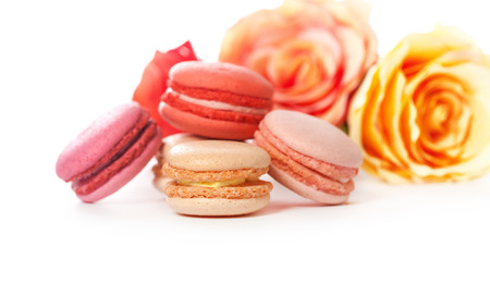 Colorful fresh macaroons over white background. Fruit and berry vanilla flavoured macarons selection assorted and shot in studio.の写真素材