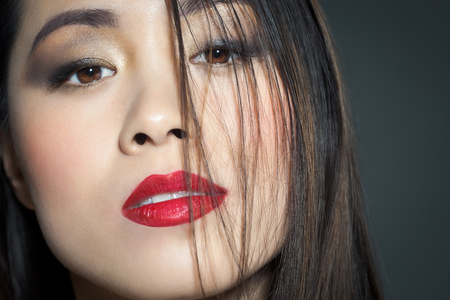 Beautiful young Asian woman portrait with fashionable makeup.の写真素材