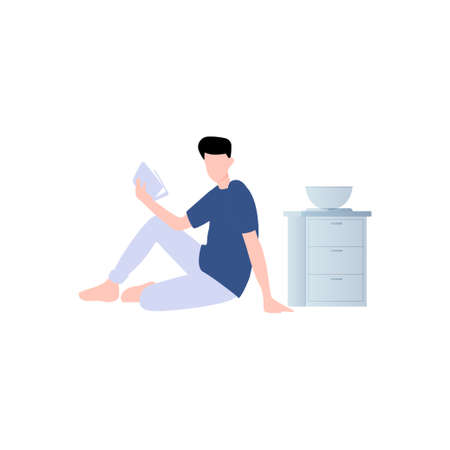 The boy is reading the book.のイラスト素材