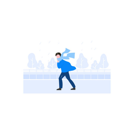 The boy is walking in the rain.のイラスト素材