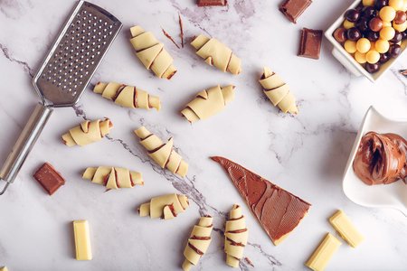Making chocolate mini croissants