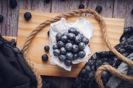 Still life of strawberry and blueberries. Dark food. Sweet dessert.