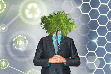 ECO Businessman. Have a good idea. Businessman with a tree per head. Ecology, business and finance conceptの写真素材