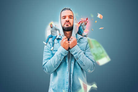 Portrait of young posing in casual and modern clothing in a parkの写真素材