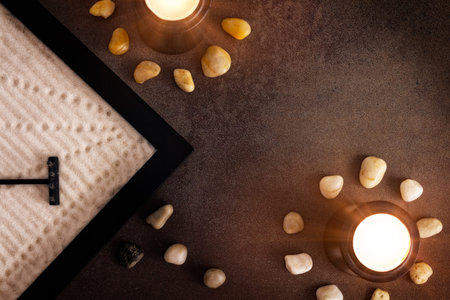 Composition of candles, stones and Zen Arenal seen from above.の写真素材