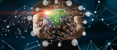 Man holding the Earth for connectivity, data exchange, and international telecommunications. Mixed...