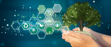 Woman holding tree with recycling symbols and green planet. Eco concept, ecology, clean energy and...