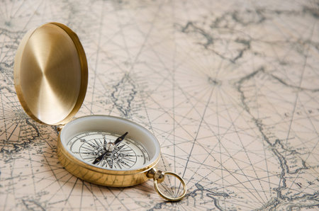 Compass on the old map