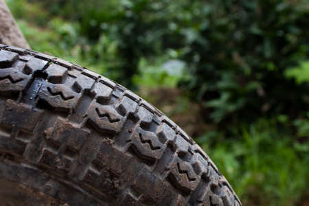 Dirty Wheelbarrow Wheel After Work. This image works perfectly for any of your projects: web, tv, videos, vlogs, documentaries and other visuals!の写真素材