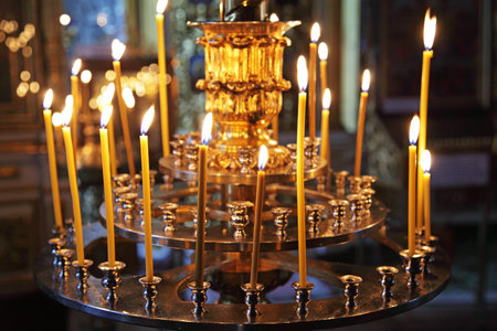 Burning candles in Christian church