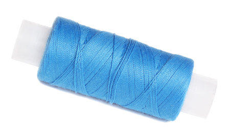 Blue coil with threads, it is isolated on the white