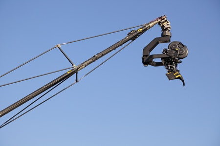 Movie camera on an gibbet against the blue skyの写真素材