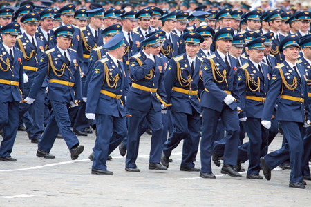 MOSCOW - MAY 6: Soldiers participate in a review dress rehearsal on May 6, 2010 in Moscow. Soldiers disperse after parade. The rehearsal is to celebrate the upcoming 65th Anniversary of Victory Day (WWII) on May 9th.のeditorial素材