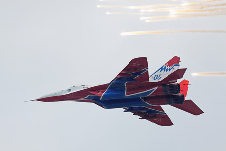 MOSCOW - MAY 06: Celebrations of the 20th anniversary of the flight groups Strizhi and Russian Knights (Russkie Vityazi) on aerodrome Kubinka on May 6, 2011 in Moscow, Russia. SU-27 saluteのeditorial素材