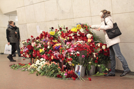MOSCOW, RUSSIA - MAR 29: Natural flowers in the Moscow underground at station Lubyanka in an anniversary of memory of victims at acts of terrorism on Mar 29, 2011 in Moscow.のeditorial素材
