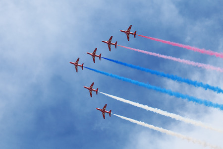 ZHUKOVSKY, RUSSIA  AUG 11: The opening ceremony of celebrating of the 100 anniversary of Russian air force. August, 11, 2012 at Zhukovsky, Russia. Aerobatic team Red Arrows Royal Air Force of United Kingdom in the skyのeditorial素材