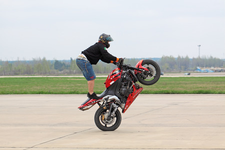 KUBINKA, MOSCOW OBLAST - MAY 06: Celebrations of the 20th anniversary of the flight groups Strizhi and Russian Knights on aerodrome Kubinka on May 6, 2011 in Moscow oblast, Russia. Demonstration performances of Stuntridingのeditorial素材