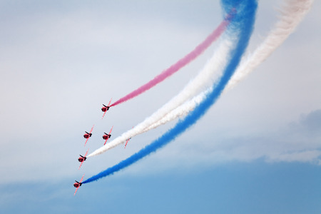 ZHUKOVSKY, RUSSIA  AUG 11: The opening ceremony of celebrating of the 100 anniversary of Russian air force. August, 11, 2012 at Zhukovsky, Russia. Aerobatic team Red Arrows Royal Air Force of United Kingdom in the skyのeditorial素材