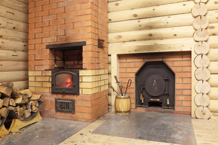 Two of the stove in a wooden log bath, for heating and steam roomsのeditorial素材