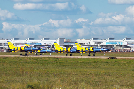 ZHUKOVSKY, RUSSIA - AUGUST 19: Àerobatic team "Baltic Bees" take-off at the International Aviation and Space salon (MAKS) on August 19, 2011 in Zhukovsky, Russiaのeditorial素材