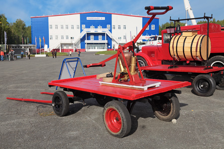 NIZHNY TAGIL, RUSSIA- AUG 23: Fire retro appliances - hand pump at exhibition RUSSIAN DEFENCE EXPO...