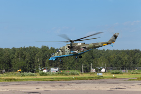 Landing of military helicopter to the airfield