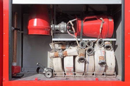 Open side of the fire engine with fire equipment