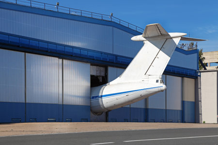 Passenger aircraft in the hangar for repairs and maintenanceの写真素材
