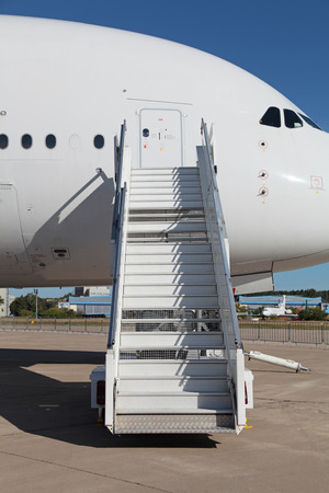 Ladder near the entrance to the  large passenger airliner, nobodyの写真素材