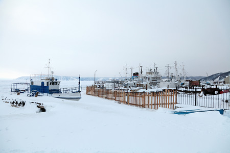 Ships in the winter mooring on lake Baikal, Siberia, Russiaの写真素材