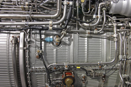 Fragment of aircraft turbo-jet engine, background