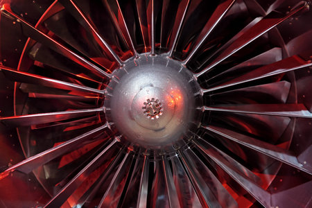 Turbo-jet engine of the plane, close up in the red light