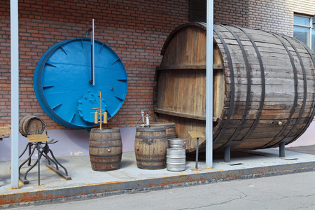 MOSCOW, RUSSIA, OCHAKOVO BREWERY - JUN 13: The exposition of retro-equipment for brewing. Old barrels for aging beerのeditorial素材