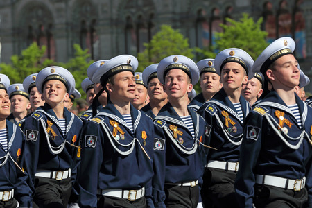 MOSCOW, RUSSIA - MAY 09, 2014: Celebration of the 69th anniversary of the Victory Day (WWII). Solemn marching of soldiers in Red Square. The cadets of the St. Petersburg Sea Cadet Corpsのeditorial素材