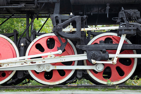 Drive wheels of the old steam locomotive, close-upの写真素材