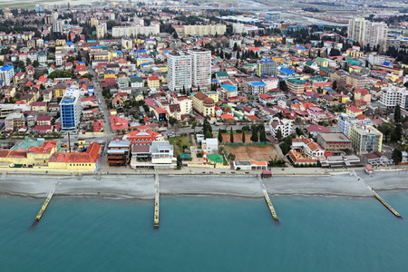 SOCHI, RUSSIA - MAR 02, 2014: Cityscape, view from above of a Adler district and black sea embankmentのeditorial素材