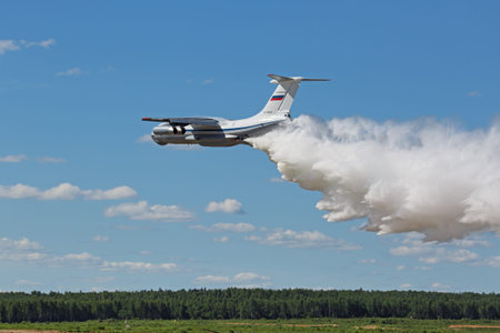 MILITARY GROUND ALABINO, MOSCOW OBLAST, RUSSIA - JUN 18, 2015: The flying aerial firefighting...