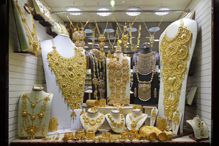 DUBAI, UNITED ARAB EMIRATES (UAE) - FEB 04, 2014: Luxury gold jewelry in vitrine jewelry storeのeditorial素材