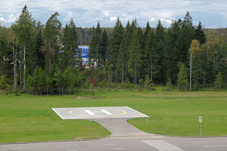 Empty helipad on the outskirts of the forestの写真素材