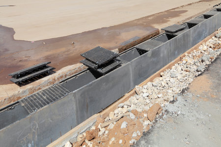 Construction of pavement, installation of storm drainの写真素材