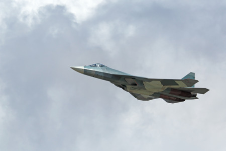 ZHUKOVSKY, MOSCOW REGION, RUSSIA - AUG 30, 2015: Flight demonstration Sukhoi PAK FA T-50 (Prospective Airborne Complex of Frontline Aviation) fifth-generation jet fighter at the International Aviation and Space salon MAKS-2015のeditorial素材